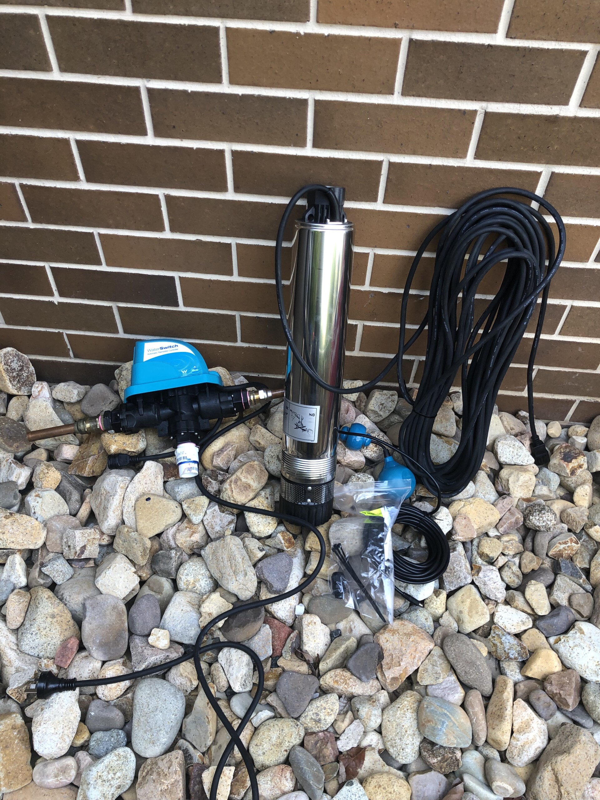 Onga Dominator submersible pump with rainwater switch about to be installed at a Canberra home